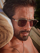 Shahid Kapoor taking a shirtless pool selfie, showing off his toned body and fitness dedication.jpg