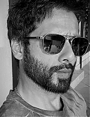 Shahid Kapoor jokingly debating eating more cake with funny expressions and 'Tu Mota Kinna Ho Gya' playing in the background.jpg